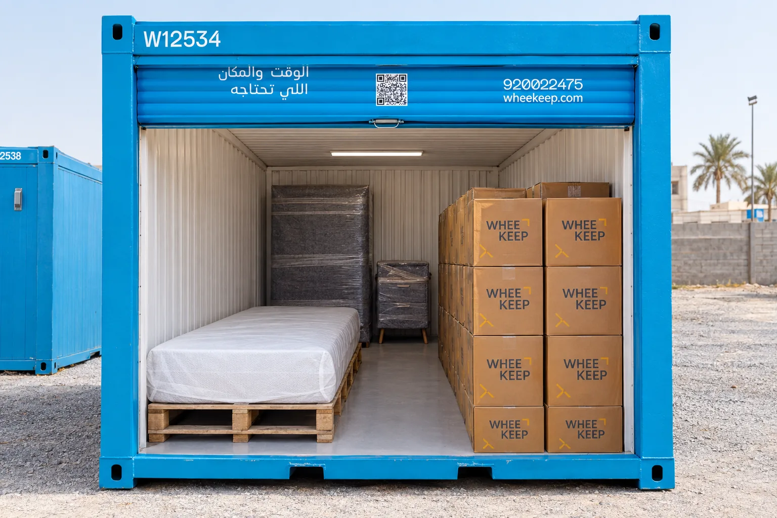 Inside a WheeKeep pod: the bagged mattress flat on pallets with nothing on top, cartons stacked beside it